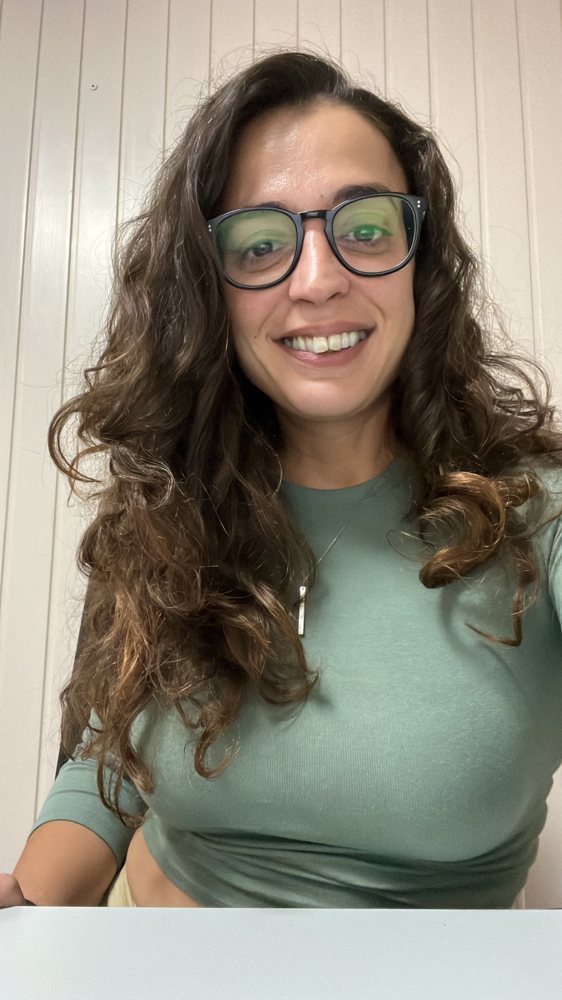 Portrait of Alicia wearing a green top